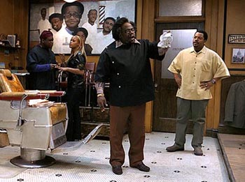 Ice Cube looks on in frustration as the hilarious Cedric the Entertainer steals yet another scene.