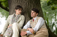 We're two handsome young lads in suits by a tree. How manly!