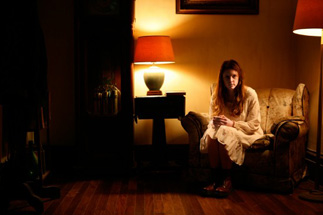 She's skulking in the corner, but you don't see her.