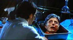 Let's see...my decapitated head's is stuck in a pan.  Hey!  You're a mad scientist!