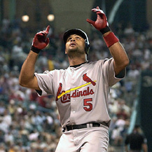 Former Peoria Chief Albert Pujols celebrates what seems like his zillionth home run.