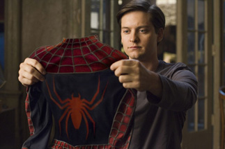 Tobey is melancholy as he puts away the suit for the last time.