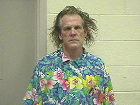 Hair by Nick Nolte. Shirt by K-Mart. 