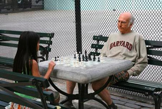 Alas, the Harvard sweatshirt doesn't make him a better chess player.