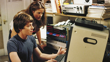 Ferris Bueller and Ally Sheedy use a giant, awkward computer!