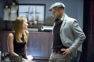 One presumes Billy Zane is giving her instructions on how to be evil.