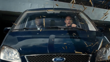 Deadpool and Nick Fury crash a car.