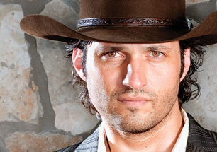 The man likes his cowboy hats.